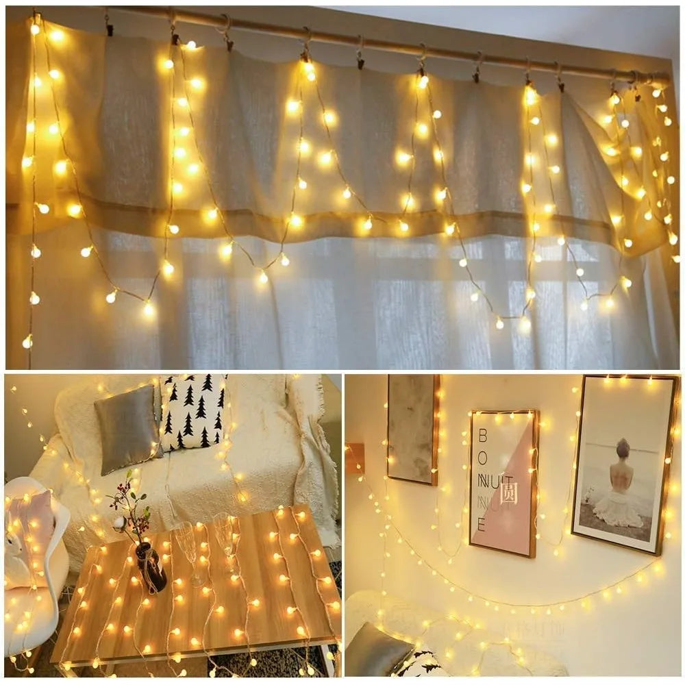 Warm white globe string lights displayed across curtains and a cozy room