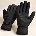 Close-up of black winter cycling gloves showing the dial closure and grip texture